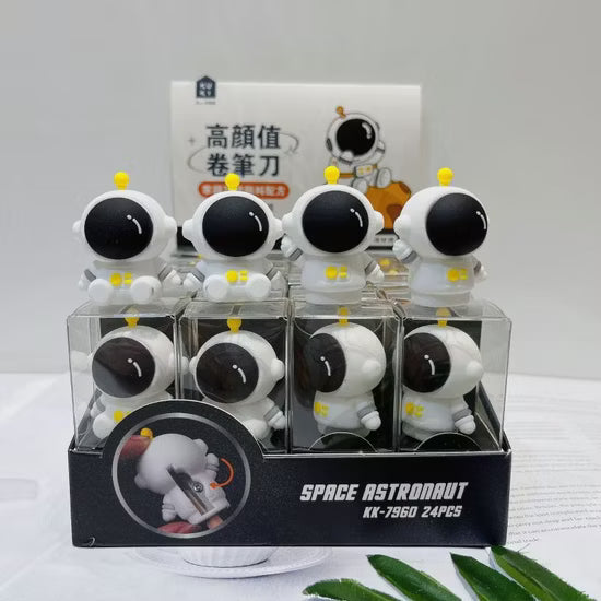 White astronaut-shaped sharpner