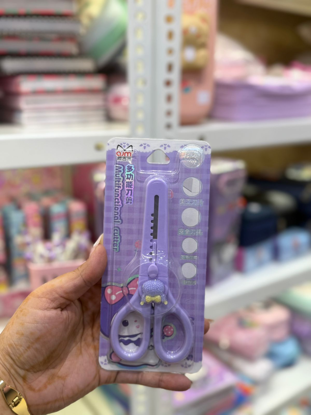 Purple multifunctional cutter in packaging